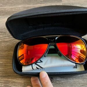 Pit Viper Lift-Offs in black and red reflective lense. New in box, with case
